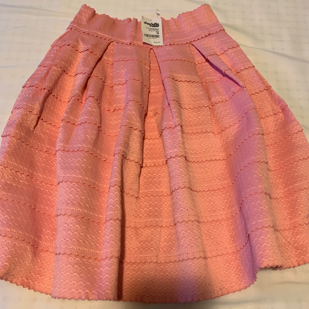 Light pink texture elastic waist flare shirts